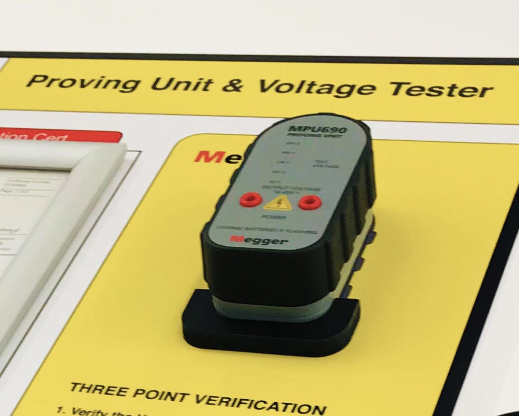 Megger proving unit and voltage tester on proving unit board
