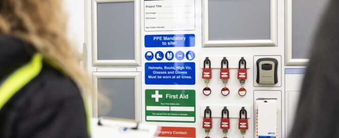QEHS Portable Board showing safety padlocks, miniature key safe, safety tags and site safety information